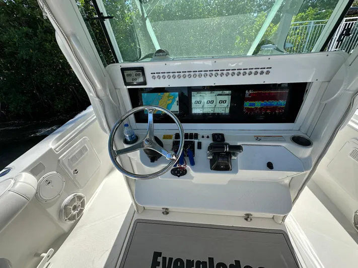  Yacht Photos Pics 2008 Everglades 350 CC boat dashboard with steering wheel and navigation screens.
