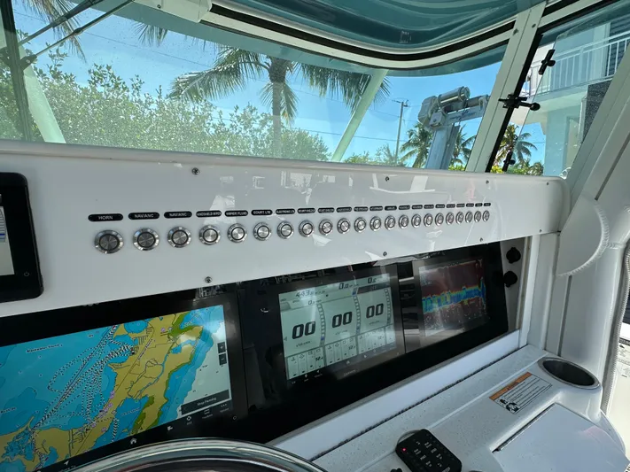  Yacht Photos Pics Dashboard of a 2008 Everglades 350 CC boat with navigation screens and controls.