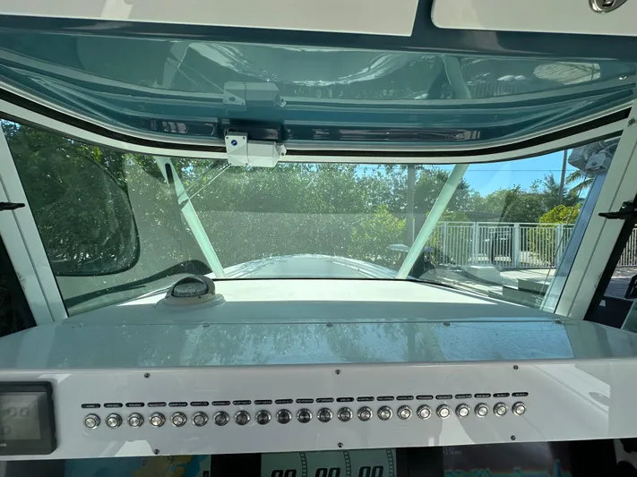  Yacht Photos Pics 2008 Everglades 350 CC boat dashboard with control panel and windshield view.