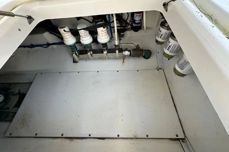  Yacht Photos Pics 2008 Everglades 350 CC boat compartment with filters and wiring.