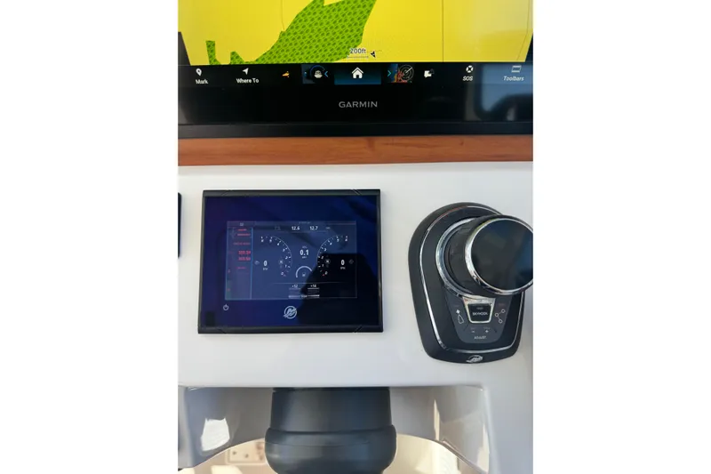  Yacht Photos Pics 2024 Back Cove 34O helm with Garmin navigation and control panel.