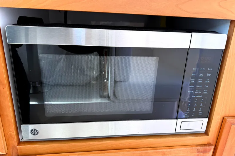  Yacht Photos Pics Built-in GE microwave in a 2024 Back Cove 34O yacht kitchen.