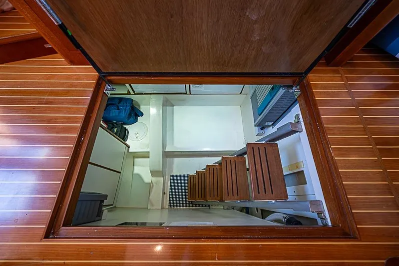 Hayride Yacht Photos Pics Engine room access hatch on 2013 Grand Banks 43 Europa yacht with wooden steps.