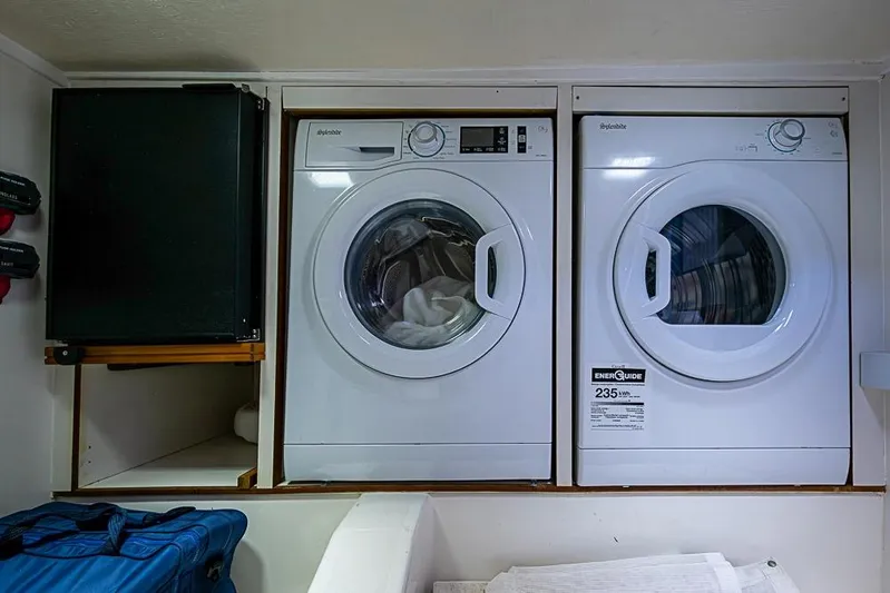 Hayride Yacht Photos Pics Laundry area on 2013 Grand Banks 43 Europa yacht with washer and dryer.