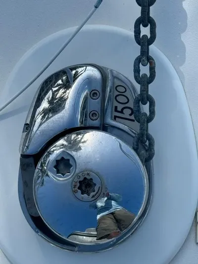  Yacht Photos Pics Close-up of a 1998 Viking 43 Convertible boat's anchor windlass with chain.