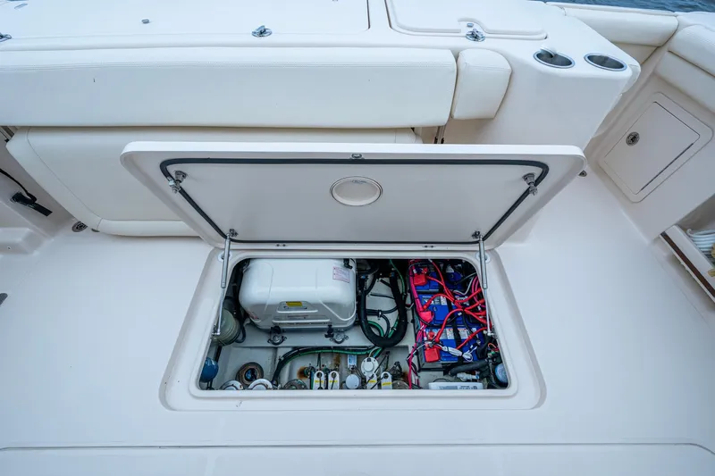  Yacht Photos Pics 2017 Grady-White Freedom 335 boat showing open hatch with engine components.