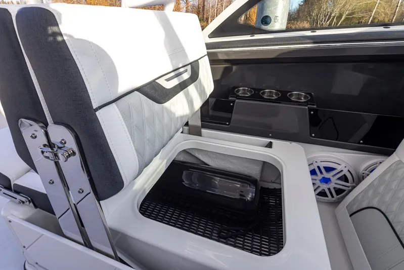  Yacht Photos Pics 2024 Blackfin 252 DC boat interior with seating and storage compartment.