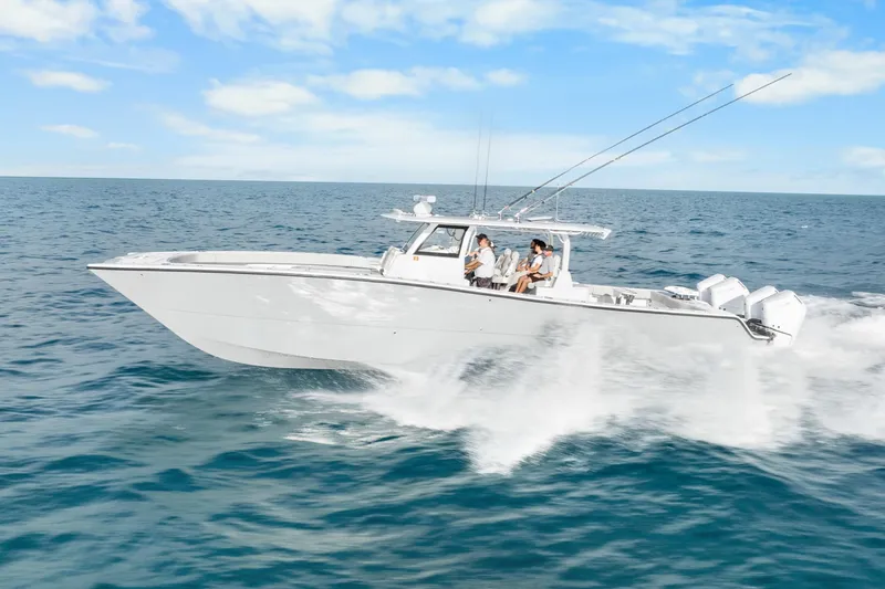  Yacht Photos Pics High-speed Freeman 47 boat cruising on open ocean, 2099 model.