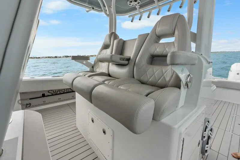  Yacht Photos Pics Luxurious seating on Freeman 47 boat, 2099 model, with ocean view.
