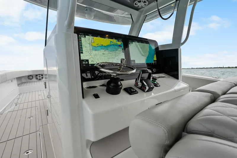  Yacht Photos Pics Cockpit of Freeman 47 boat, 2099 model, featuring advanced navigation systems and luxurious seating.