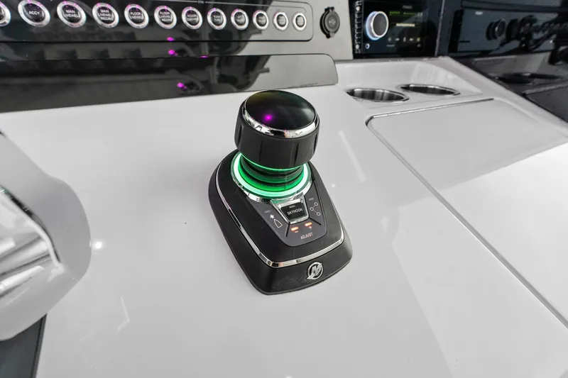  Yacht Photos Pics Control panel of Freeman 47, 2099 model, featuring advanced joystick and illuminated buttons.