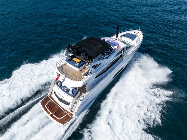 Just For Fun Yacht Photos Pics Sunseeker Manhattan 73 yacht cruising on open sea, 2011 model, aerial view.