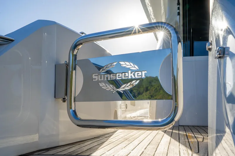 Just For Fun Yacht Photos Pics Sunseeker Manhattan 73 yacht gate, 2011 model, with sleek chrome finish and wooden deck.