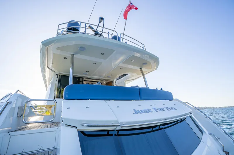 Just For Fun Yacht Photos Pics Sunseeker Manhattan 73 yacht, 2011 model, rear view with blue sky background.