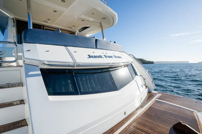 Just For Fun Yacht Photos Pics Sunseeker Manhattan 73 yacht, 2011 model, docked on a sunny day with ocean view.