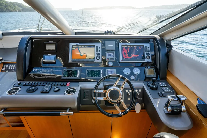 Just For Fun Yacht Photos Pics Cockpit of 2011 Sunseeker Manhattan 73 yacht with navigation controls and displays.