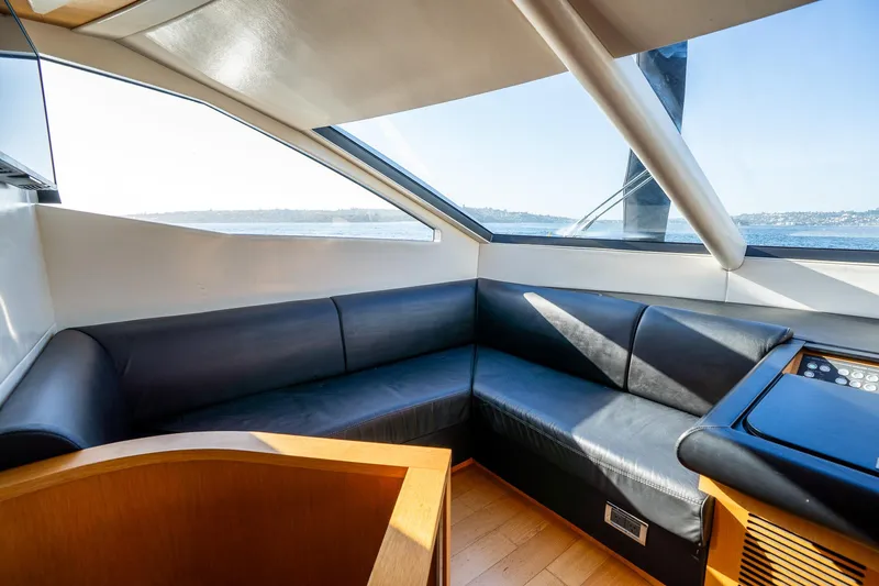 Just For Fun Yacht Photos Pics Luxurious interior of 2011 Sunseeker Manhattan 73 yacht with leather seating and panoramic windows.