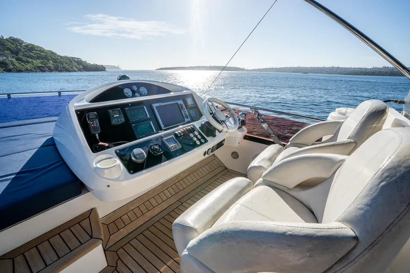 Just For Fun Yacht Photos Pics Luxurious Sunseeker Manhattan 73 yacht helm with ocean view, 2011 model.