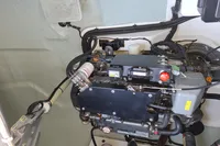 Engine compartment of a 2019 Leopard 45 yacht, showcasing mechanical components and wiring.