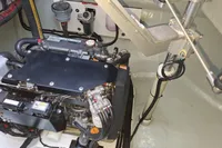 Engine compartment of a 2019 Leopard 45 catamaran, showcasing mechanical components.