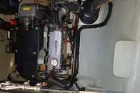 Engine compartment of a 2019 Leopard 45 catamaran, showcasing mechanical components.