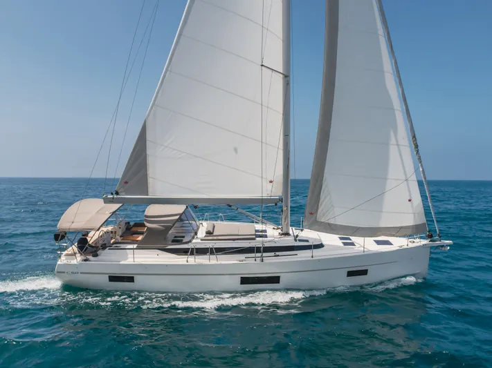 Kalesma Yacht Photos Pics 2021 Bavaria C50 Style sailing yacht cruising on open sea.