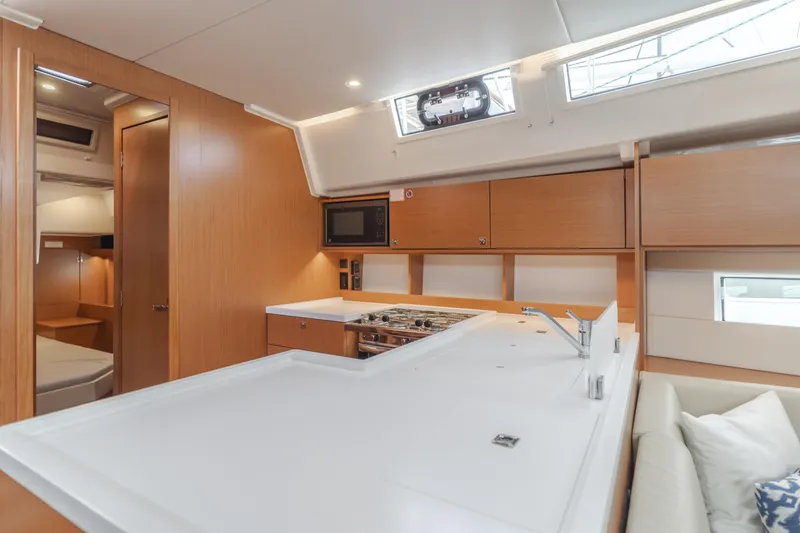 Kalesma Yacht Photos Pics Modern interior of 2021 Bavaria C50 Style yacht with sleek kitchen design.