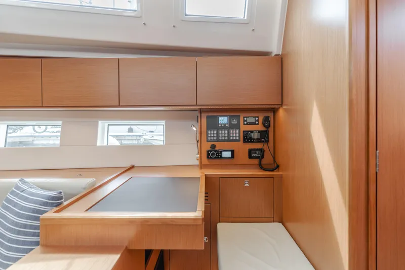 Kalesma Yacht Photos Pics Interior of 2021 Bavaria C50 Style yacht with navigation controls and seating area.