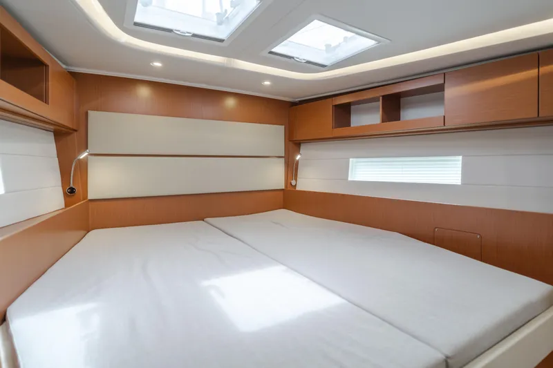 Kalesma Yacht Photos Pics Luxurious interior of 2021 Bavaria C50 Style yacht cabin with skylights and modern design.