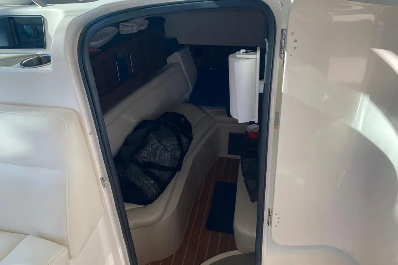  Yacht Photos Pics 2024 Grady-White Freedom 375 cabin interior with seating and storage.