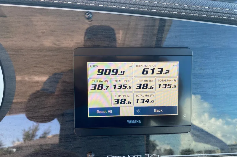  Yacht Photos Pics Display screen on 2024 Grady-White Freedom 375 showing trip data and fuel usage.