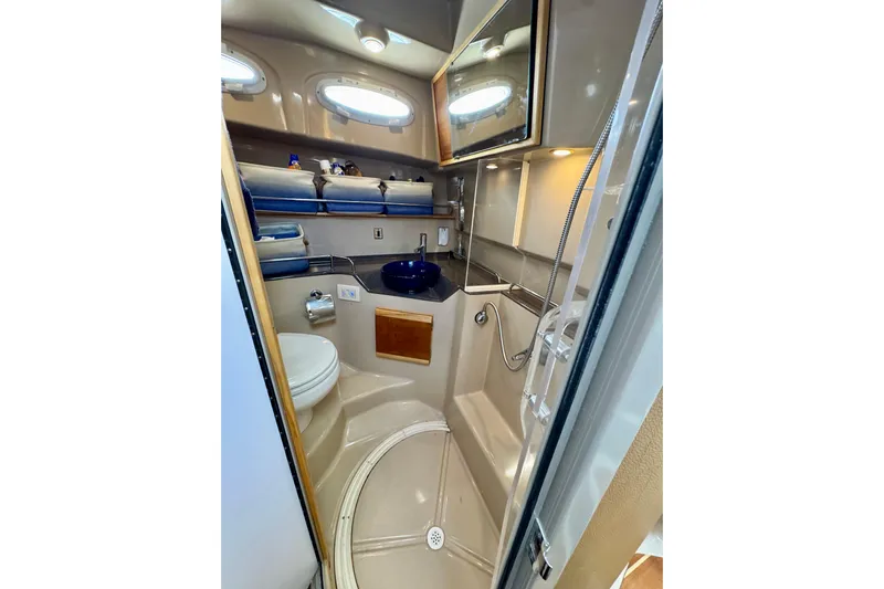  Yacht Photos Pics Compact bathroom in 2014 Cutwater C30 Sedan NW boat with shower and toilet.