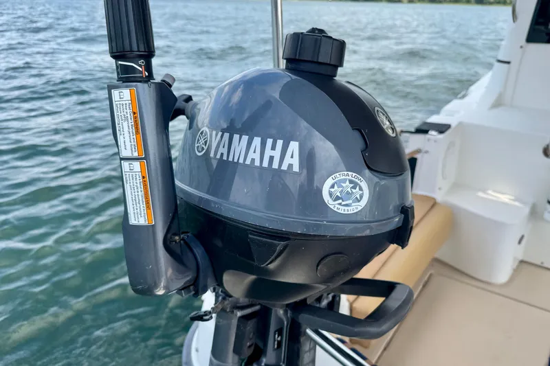  Yacht Photos Pics Yamaha outboard motor on 2014 Cutwater C30 Sedan NW boat, near water.