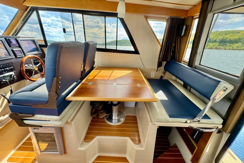  Yacht Photos Pics Interior of 2014 Cutwater C30 Sedan NW boat with seating and navigation area.