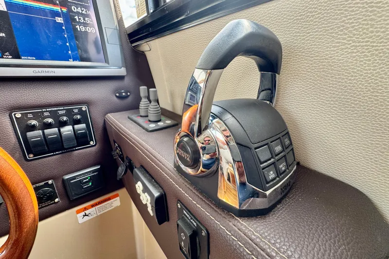  Yacht Photos Pics Control panel of 2014 Cutwater C30 Sedan NW boat with Garmin display and throttle.