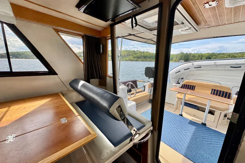  Yacht Photos Pics Interior view of 2014 Cutwater C30 Sedan NW boat with lake scenery.