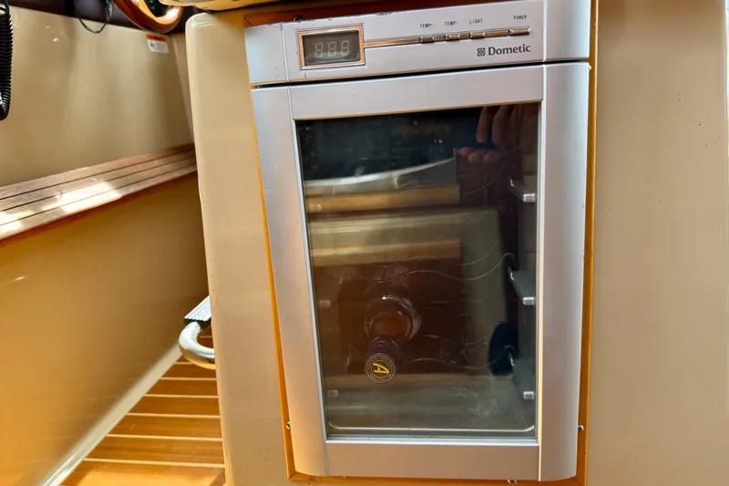  Yacht Photos Pics Dometic fridge inside 2014 Cutwater C30 Sedan NW boat, featuring a digital display.