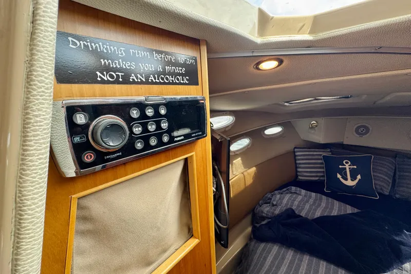  Yacht Photos Pics Interior of 2014 Cutwater C30 Sedan NW with nautical decor and humorous sign.