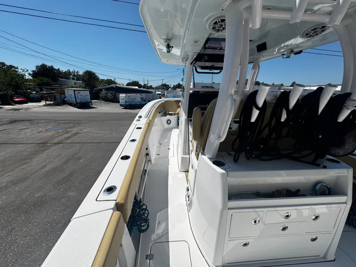  Yacht Photos Pics 2024 Sportsman Open 322 Center Console boat interior with seating and storage compartments.