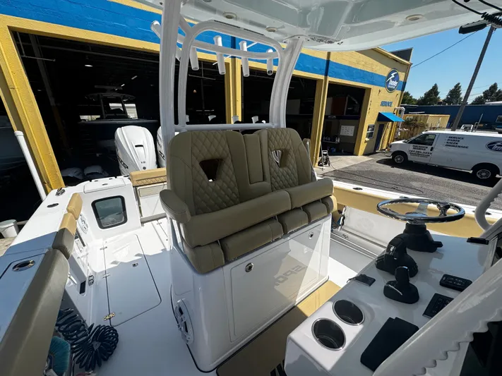  Yacht Photos Pics 2024 Sportsman Open 322 Center Console boat interior with helm and seating.