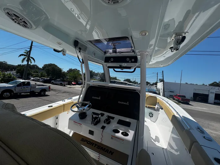  Yacht Photos Pics 2024 Sportsman Open 322 Center Console boat interior with Garmin navigation system.