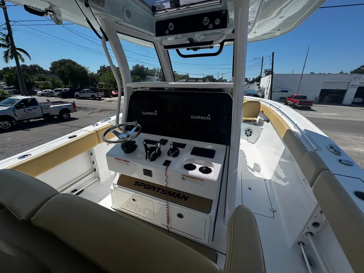  Yacht Photos Pics 2024 Sportsman Open 322 Center Console boat interior with Garmin navigation system.