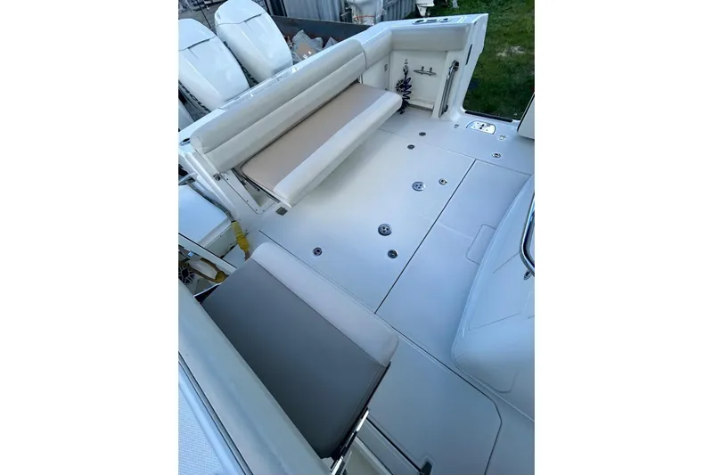  Yacht Photos Pics 2017 Boston Whaler 380 Outrage boat interior with seating and deck view.