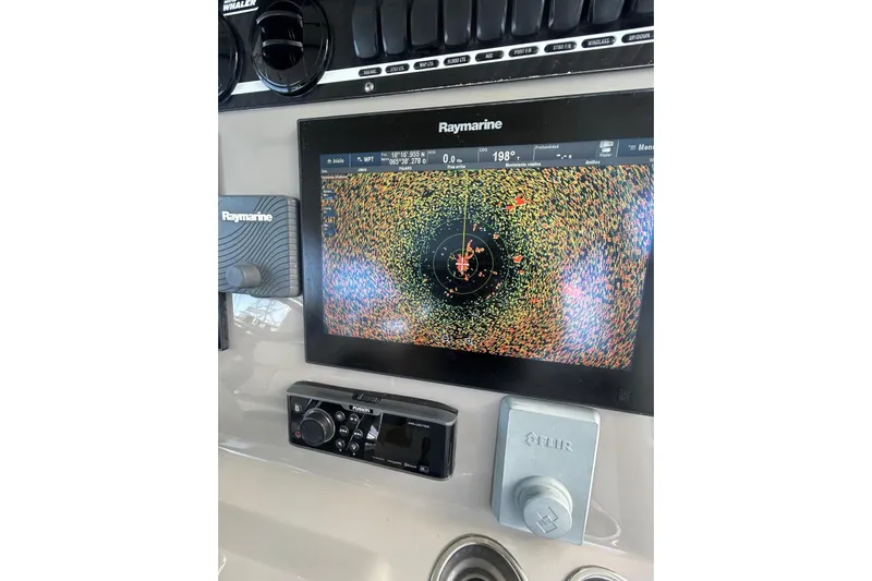  Yacht Photos Pics Control panel of a 2017 Boston Whaler 380 Outrage with Raymarine display.