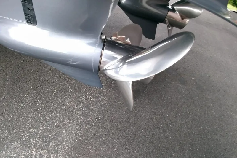  Yacht Photos Pics Close-up of a 2024 Parker 2820 XLD Sport Cabin boat propeller on asphalt.