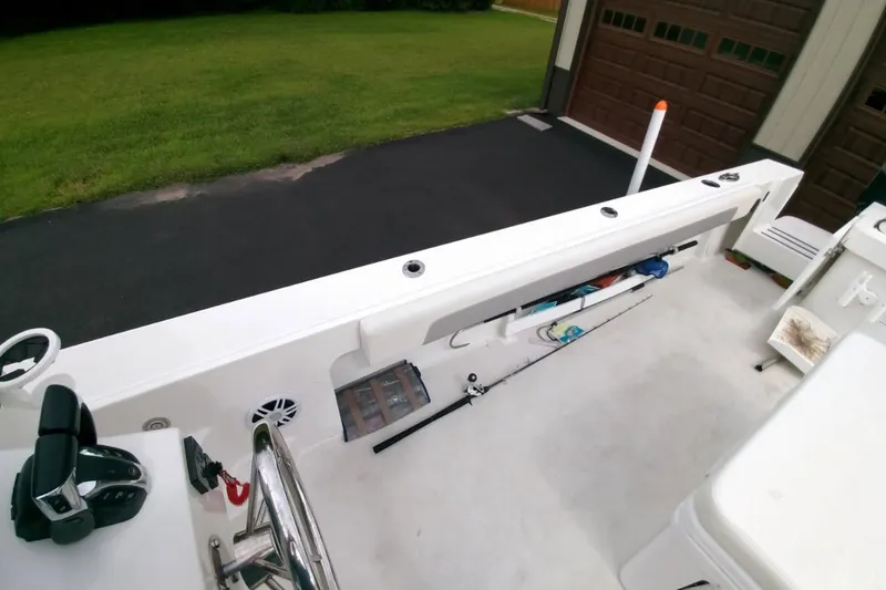  Yacht Photos Pics 2024 Parker 2820 XLD Sport Cabin boat interior with fishing gear storage.