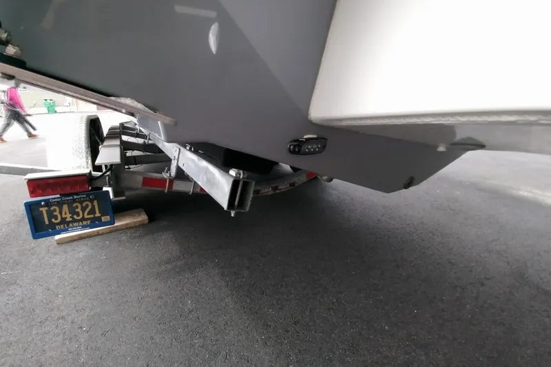  Yacht Photos Pics 2024 Parker 2820 XLD Sport Cabin on trailer, Delaware license plate visible.