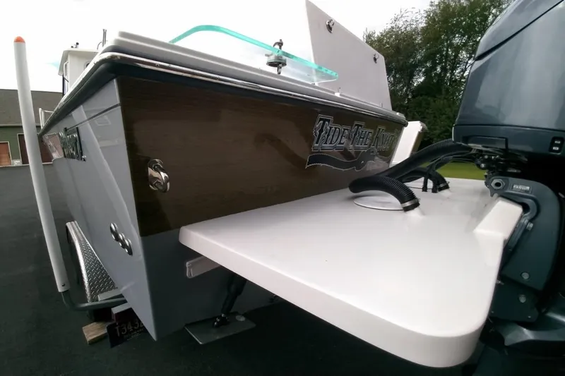  Yacht Photos Pics 2024 Parker 2820 XLD Sport Cabin boat with outboard motor and sleek design.