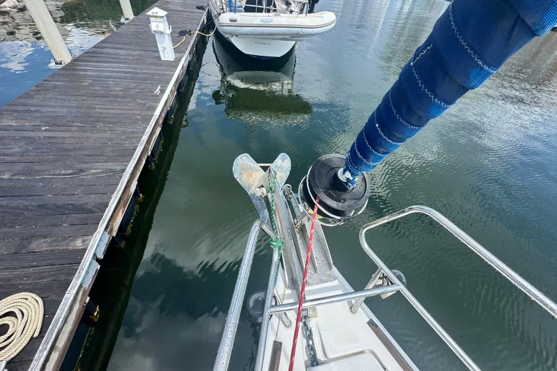  Yacht Photos Pics Beneteau Oceanis 50 sailboat docked, showing anchor and deck details, 2011 model.