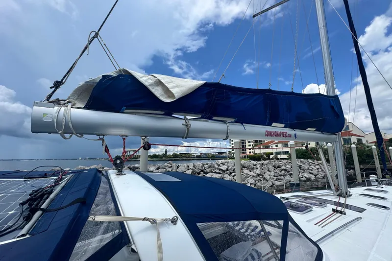  Yacht Photos Pics Sailboat Beneteau Oceanis 50, 2011 model, docked with blue sail cover and solar panels.